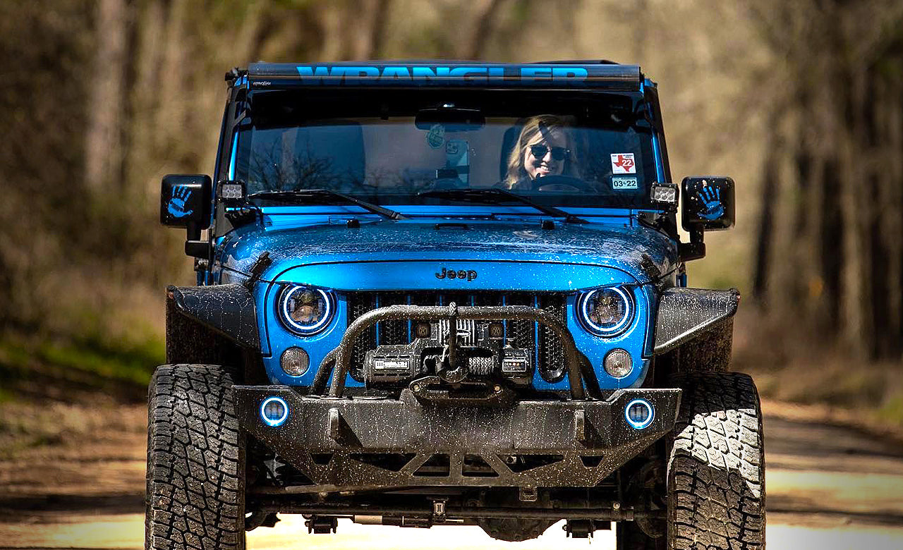 Installing the H3R HalGuard fire extinguisher to the seat rails of Jeep JK