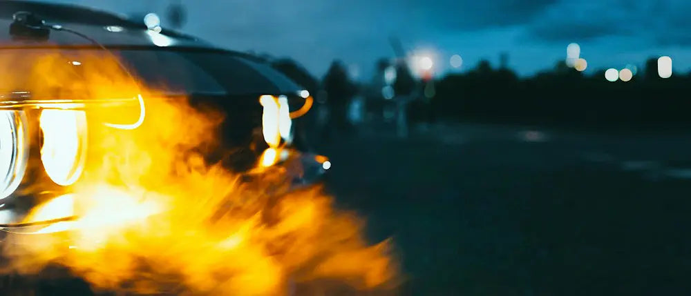 Dodge Charger with smoke coming out of the hood